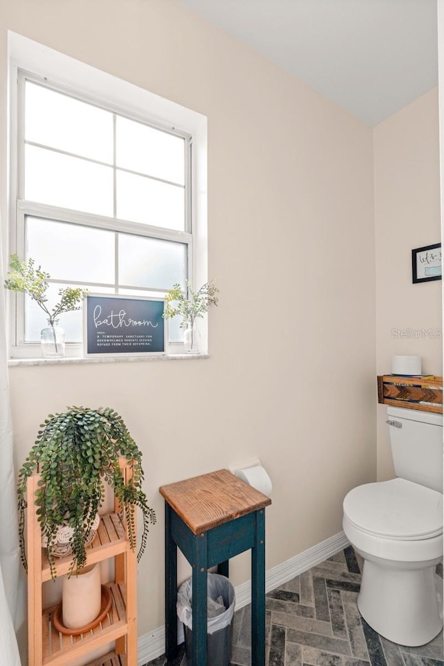 3292 NE 42nd Pl, Ocala, FL 34479 - bathroom featuring baseboards