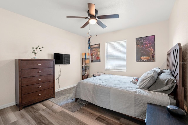 3292 NE 42nd Pl, Ocala, FL 34479 - bedroom featuring wood finished floors and ceiling fan