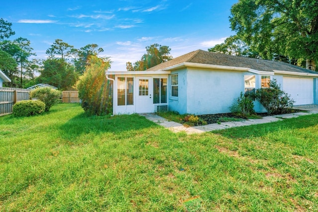 3292 NE 42nd Pl, Ocala, FL 34479 - view of front of property featuring a sunroom, an attached garage, and stucco siding