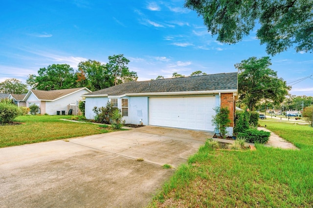 3292 NE 42nd Pl, Ocala, FL 34479 - ranch-style house with a front yard, an attached garage, concrete driveway, and brick siding