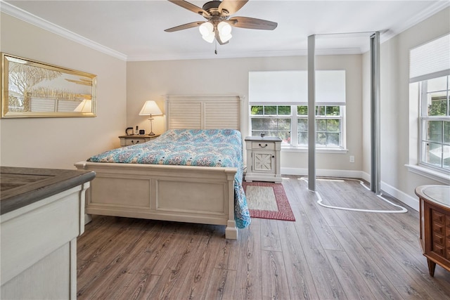 174 SW Dalmation Ln, Lake City, FL 32024 - bedroom featuring crown molding, wood finished floors, and ceiling fan