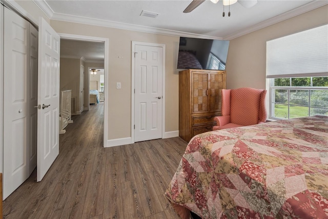 174 SW Dalmation Ln, Lake City, FL 32024 - bedroom with wood finished floors, crown molding, and ceiling fan