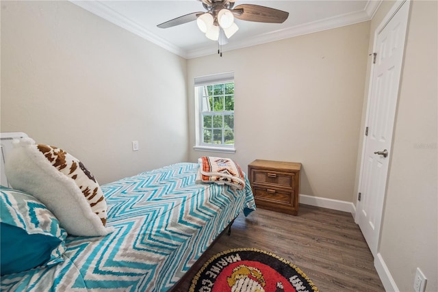 174 SW Dalmation Ln, Lake City, FL 32024 - bedroom with ornamental molding, wood finished floors, and a ceiling fan