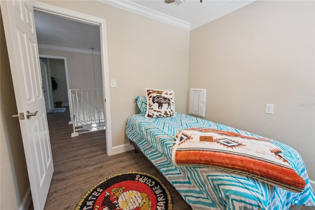 174 SW Dalmation Ln, Lake City, FL 32024 - bedroom featuring wood finished floors and ornamental molding