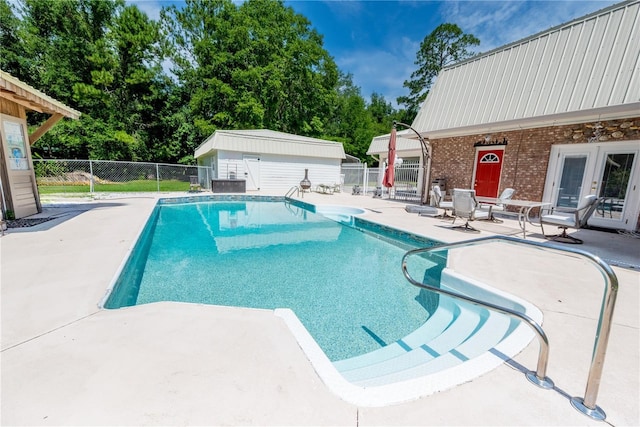 174 SW Dalmation Ln, Lake City, FL 32024 - view of swimming pool with a patio and french doors