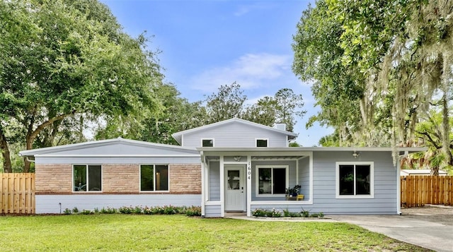 1604 NE 7th St, Gainesville, FL 32609 - view of front facade featuring stone siding