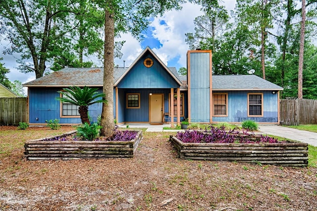 2510 NW 50th Pl, Gainesville, FL 32605 - view of front facade featuring a chimney and covered porch