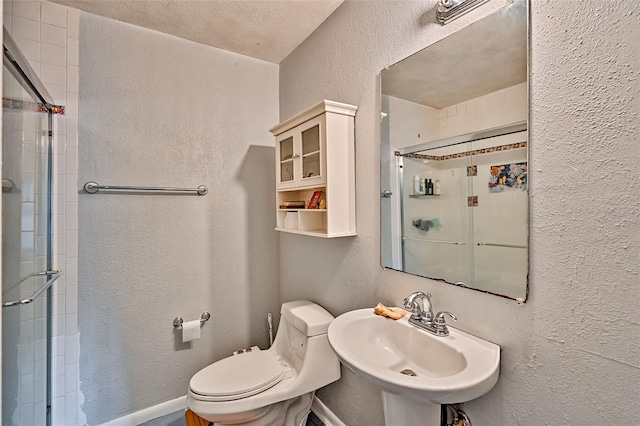 2510 NW 50th Pl, Gainesville, FL 32605 - bathroom featuring a textured wall and a stall shower