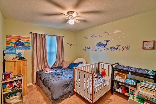2510 NW 50th Pl, Gainesville, FL 32605 - bedroom with carpet floors and a ceiling fan