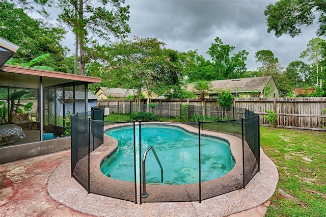2510 NW 50th Pl, Gainesville, FL 32605 - view of pool with a sunroom, a fenced backyard, and a patio area
