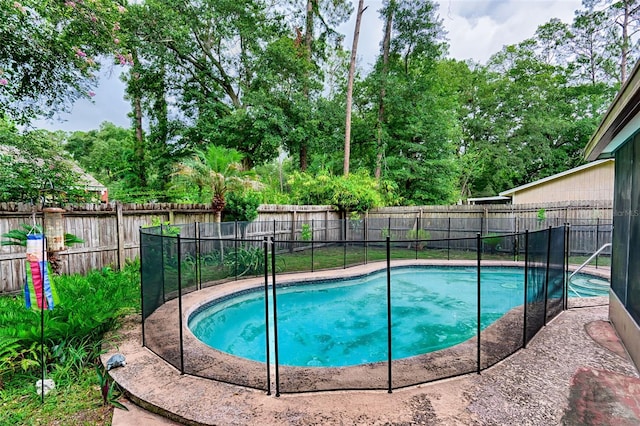 2510 NW 50th Pl, Gainesville, FL 32605 - view of swimming pool with a fenced backyard