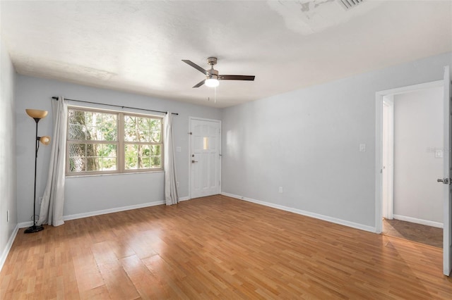 5 NW 28th Ter, Gainesville, FL 32607 - empty room featuring light wood finished floors and ceiling fan