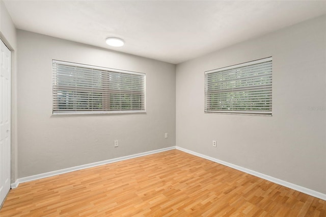 5 NW 28th Ter, Gainesville, FL 32607 - empty room featuring light wood-type flooring and baseboards