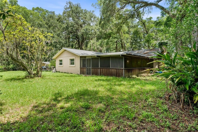 5 NW 28th Ter, Gainesville, FL 32607 - back of house with a sunroom
