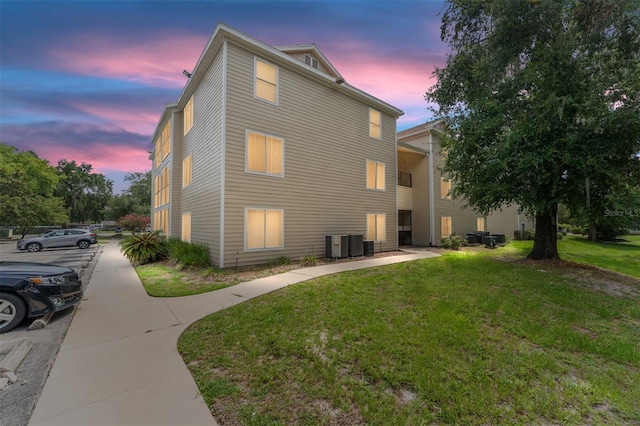 3800 SW 20th Ave Unit 210, Gainesville, FL 32607 - view of property exterior featuring a yard