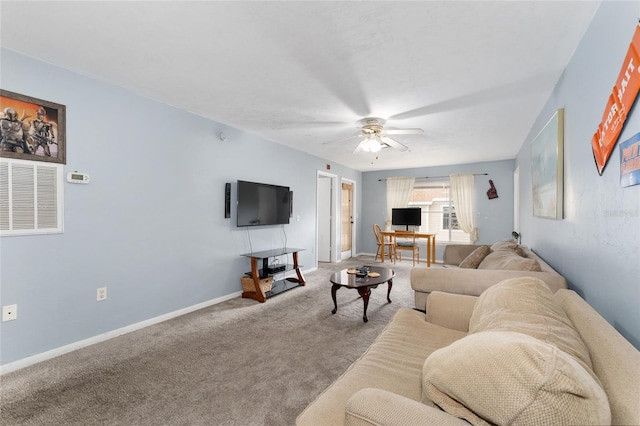 3800 SW 20th Ave Unit 210, Gainesville, FL 32607 - carpeted living room featuring a ceiling fan and baseboards