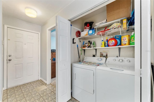 3800 SW 20th Ave Unit 210, Gainesville, FL 32607 - laundry area featuring washer and clothes dryer and light flooring