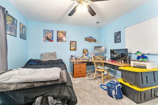 3800 SW 20th Ave Unit 210, Gainesville, FL 32607 - bedroom with carpet flooring, a desk, and a ceiling fan