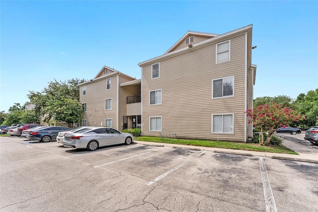 3800 SW 20th Ave Unit 210, Gainesville, FL 32607 - view of property with uncovered parking