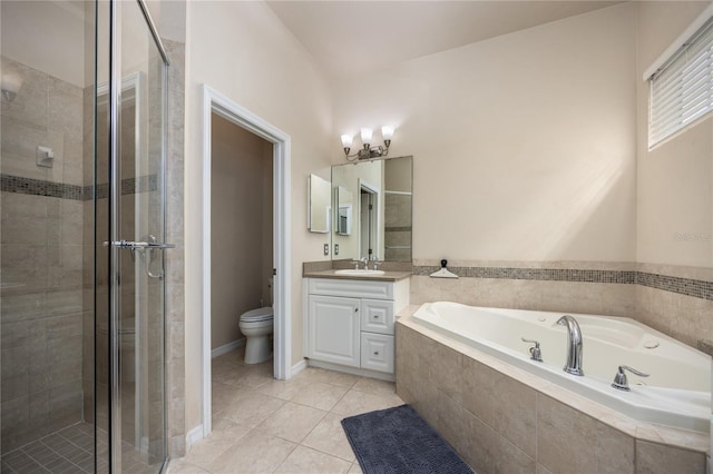 3737 SW 74th Dr, Gainesville, FL 32608 - bathroom featuring a garden tub, vanity, a shower stall, and tile patterned floors