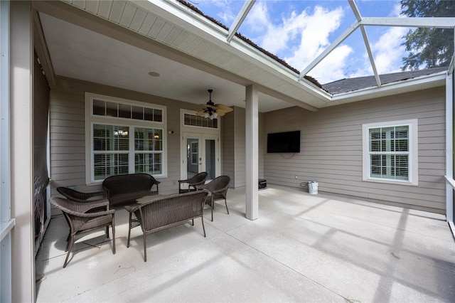 3737 SW 74th Dr, Gainesville, FL 32608 - view of patio featuring ceiling fan, glass enclosure, outdoor lounge area, and french doors