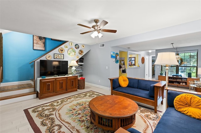 900 SW 62nd Blvd Unit H43, Gainesville, FL 32607 - living area featuring ceiling fan and baseboards