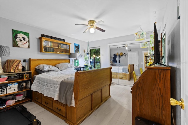 900 SW 62nd Blvd Unit H43, Gainesville, FL 32607 - bedroom featuring light wood-style floors and a ceiling fan
