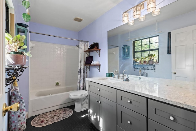 900 SW 62nd Blvd Unit H43, Gainesville, FL 32607 - bathroom featuring vanity, shower / bath combination with curtain, and tile patterned flooring