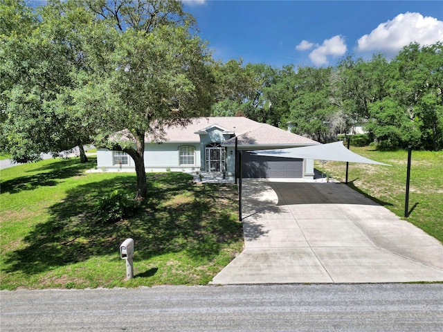 8198 N Brook Way, Citrus Springs, FL 34433 - ranch-style home with driveway, a front yard, a garage, and an attached carport