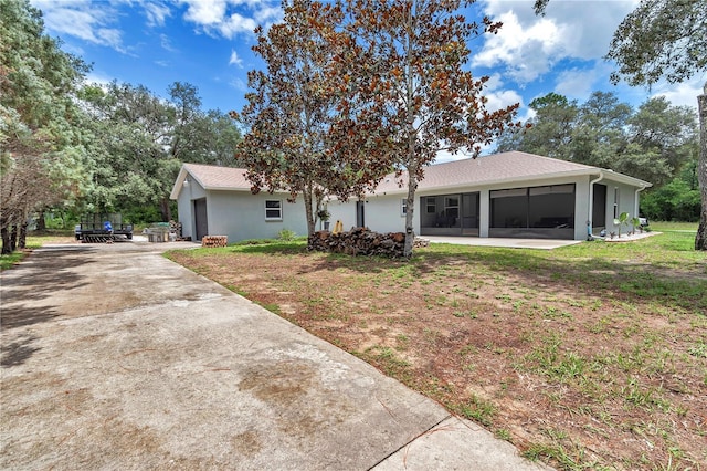 8198 N Brook Way, Citrus Springs, FL 34433 - view of front of home featuring a sunroom and stucco siding