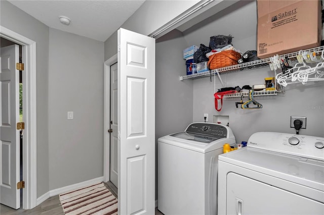 8198 N Brook Way, Citrus Springs, FL 34433 - washroom featuring washer and dryer and light wood-style floors