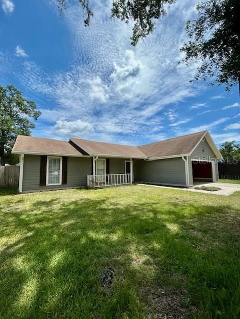 3372 Penny Ln, Middleburg, FL 32068 - ranch-style house with a garage, concrete driveway, and covered porch