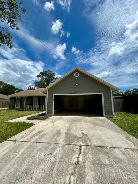 3372 Penny Ln, Middleburg, FL 32068 - view of front of property featuring concrete driveway and an attached garage