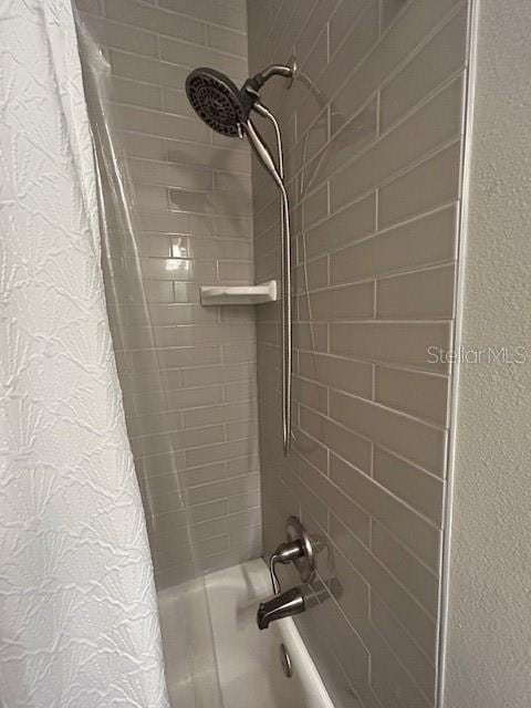 3372 Penny Ln, Middleburg, FL 32068 - detailed view of shower / bath combination with curtain