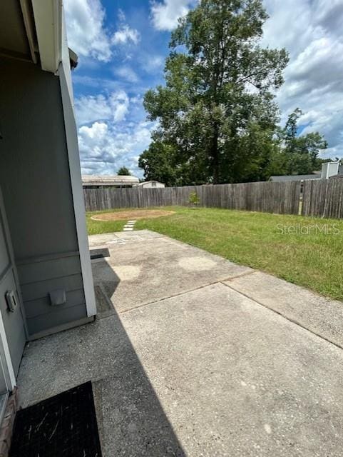3372 Penny Ln, Middleburg, FL 32068 - fenced backyard with a patio area