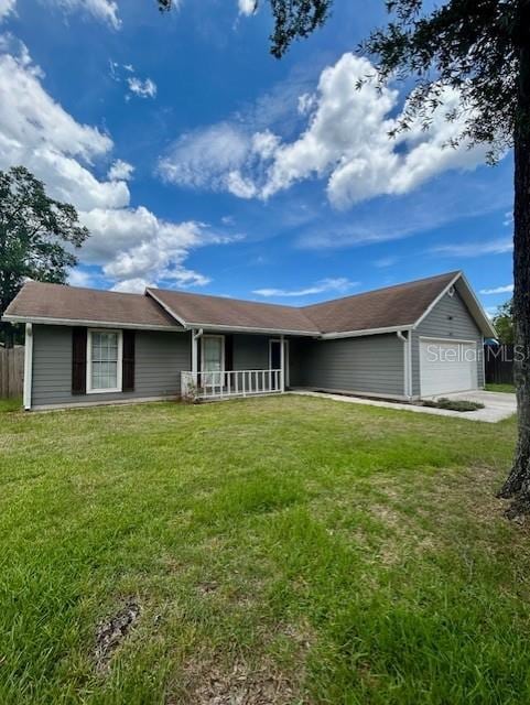 3372 Penny Ln, Middleburg, FL 32068 - ranch-style house featuring a garage and concrete driveway
