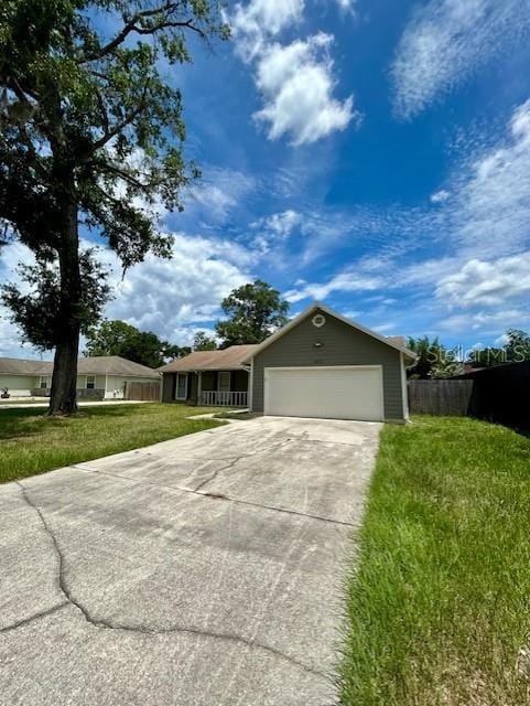 3372 Penny Ln, Middleburg, FL 32068 - ranch-style home with a garage and concrete driveway