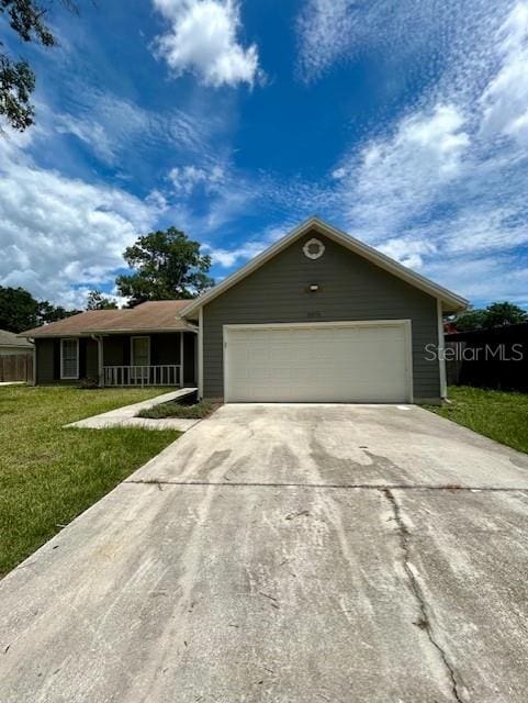 3372 Penny Ln, Middleburg, FL 32068 - single story home featuring driveway, an attached garage, and a front yard