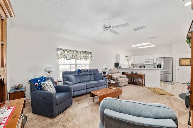 4814 NW 75th Rd, Gainesville, FL 32653 - living room with a ceiling fan, light carpet, ornamental molding, and light tile patterned floors