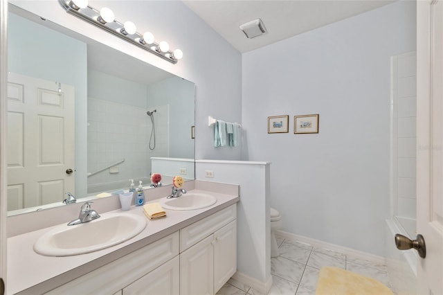 4814 NW 75th Rd, Gainesville, FL 32653 - bathroom featuring double vanity, marble finish floors, and washtub / shower combination