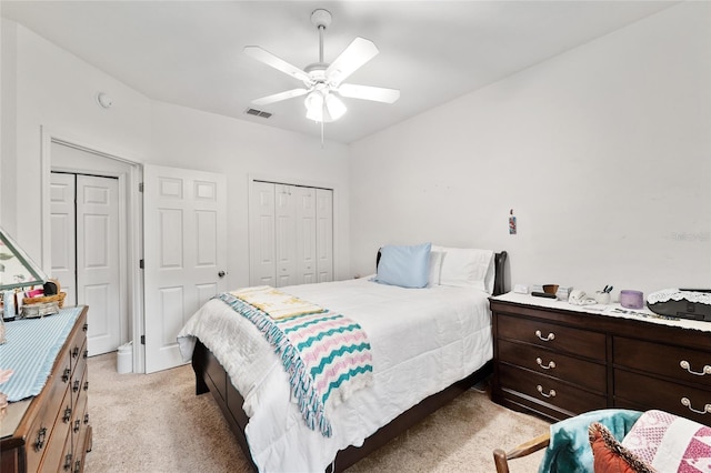 4814 NW 75th Rd, Gainesville, FL 32653 - bedroom with light carpet, ceiling fan, and a closet