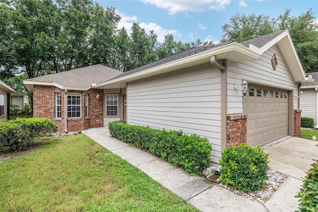 4814 NW 75th Rd, Gainesville, FL 32653 - ranch-style home with brick siding, an attached garage, concrete driveway, a shingled roof, and a front yard