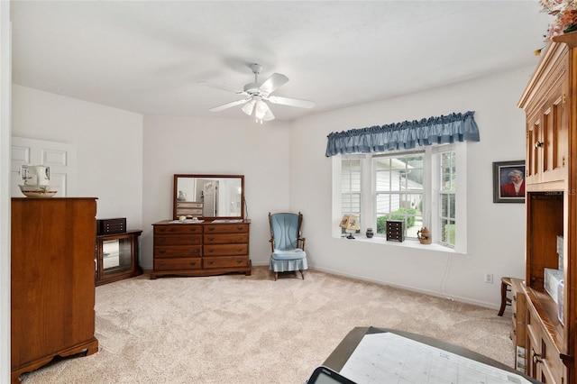 4814 NW 75th Rd, Gainesville, FL 32653 - bedroom with light carpet and ceiling fan