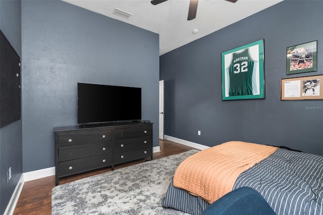6326 SW 90th St, Gainesville, FL 32608 - bedroom featuring wood finished floors and a ceiling fan