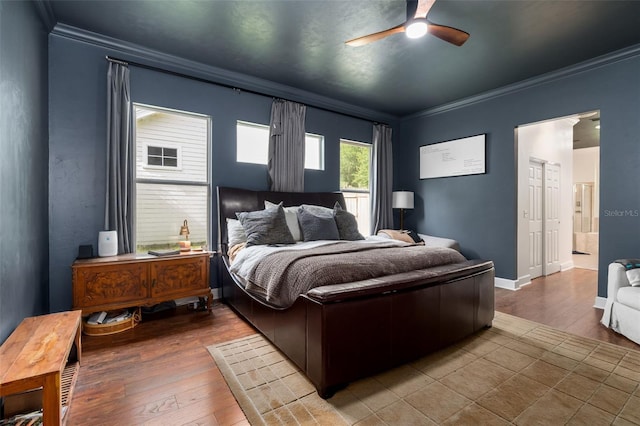 6326 SW 90th St, Gainesville, FL 32608 - bedroom featuring crown molding, wood-type flooring, and ceiling fan