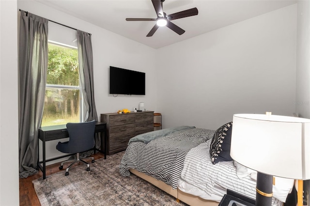 6326 SW 90th St, Gainesville, FL 32608 - bedroom featuring wood finished floors and a ceiling fan
