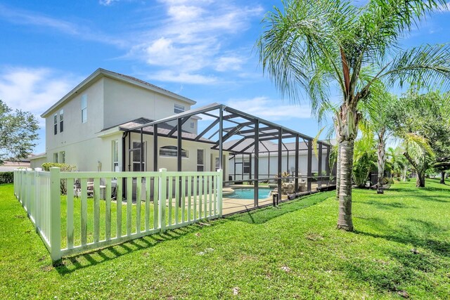 6364 Golden Eye Gln, Lakewood Ranch, FL 34202 - view of swimming pool with glass enclosure and a patio