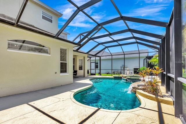 6364 Golden Eye Gln, Lakewood Ranch, FL 34202 - view of swimming pool with a patio area, a pool with connected hot tub, and a lanai