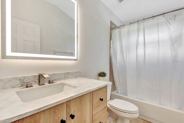 6364 Golden Eye Gln, Lakewood Ranch, FL 34202 - bathroom featuring vanity and shower / tub combo with curtain