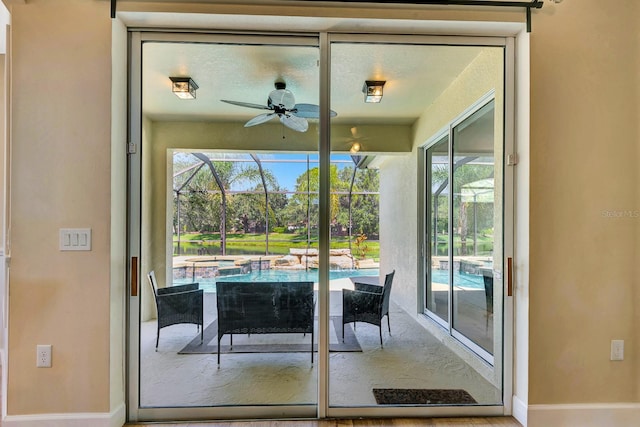 6364 Golden Eye Gln, Lakewood Ranch, FL 34202 - entryway with a sunroom, a ceiling fan, and healthy amount of natural light